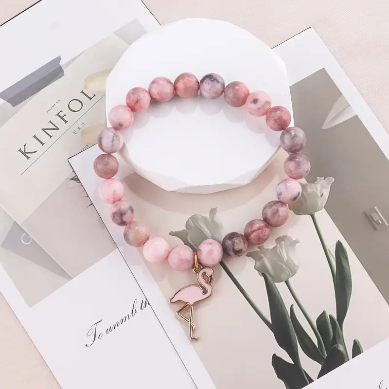 Styrka i rosa armband | Tillsammans mot bröstcancer