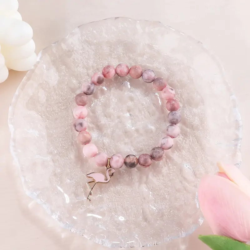 Styrka i rosa armband | Tillsammans mot bröstcancer
