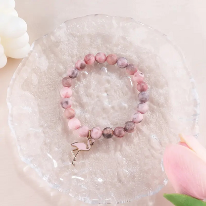 Styrka i rosa armband | Tillsammans mot bröstcancer