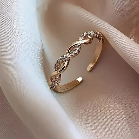 Tvinnad Elegans Ring | Tillsammans mot Bröstcancer